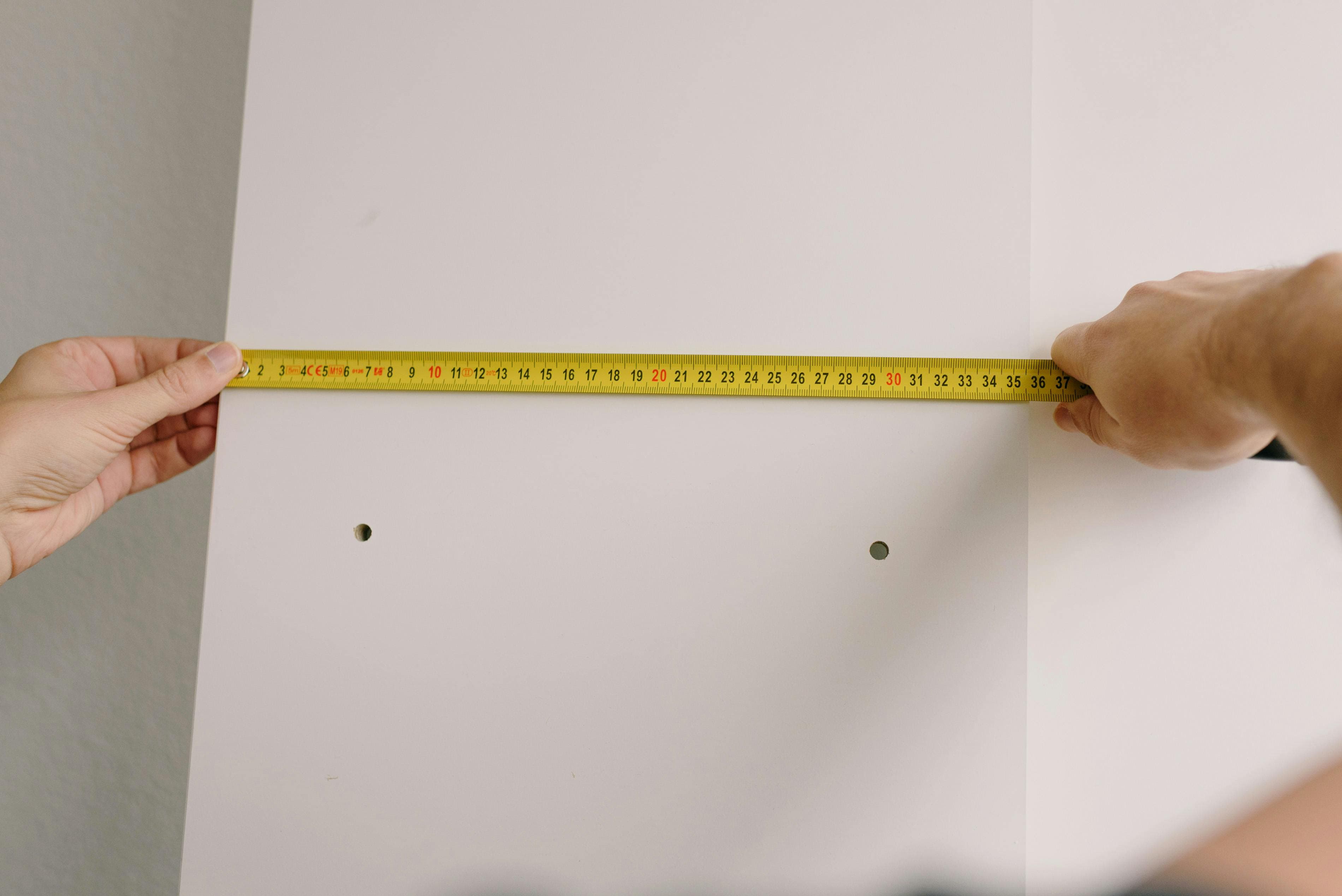 measuring tape used for land measurement explaining gaj into sq feet conversion